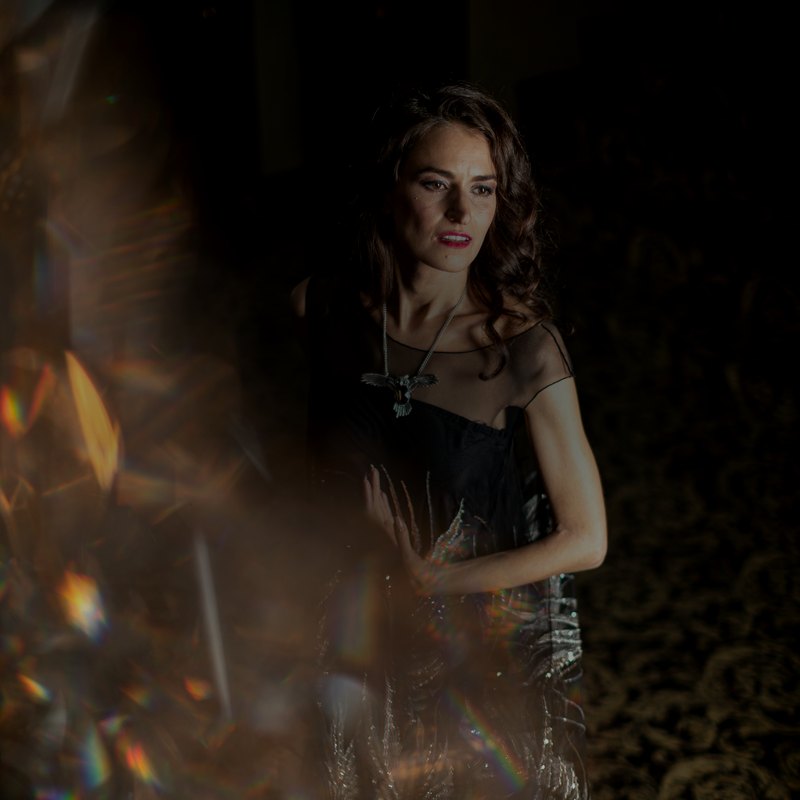 Triin Lellep — black dress, prismatic light